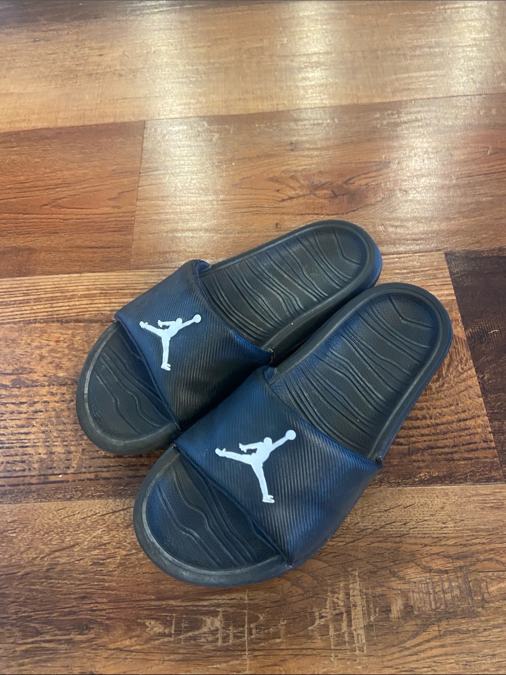 Jordan Black Slides with White Jumpman Logo